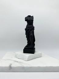 Cracker barrel witch statue
